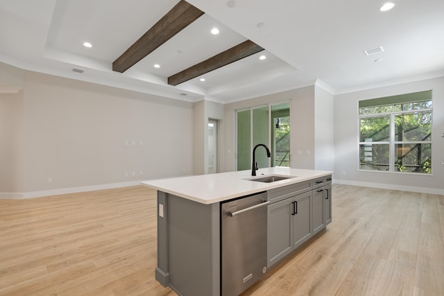 kitchen with a center island with sink, gray cabinets, dishwasher, light hardwood / wood-style floors, and sink