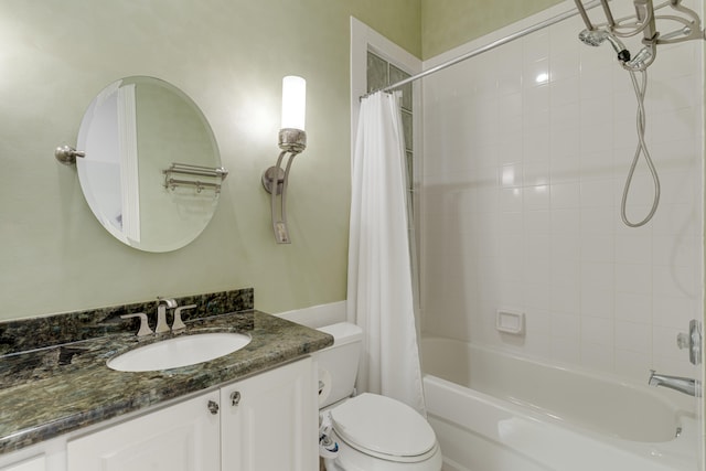 full bathroom featuring vanity, toilet, and shower / bath combo with shower curtain