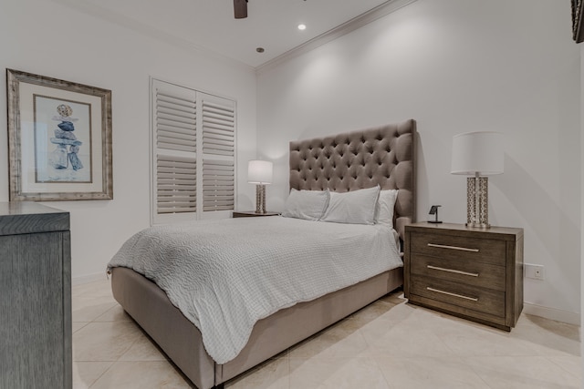 bedroom featuring crown molding, a closet, light tile patterned floors, and ceiling fan