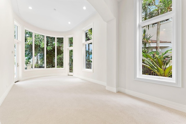 carpeted spare room with baseboards and recessed lighting