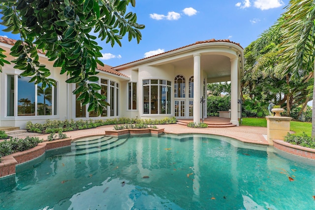 pool with french doors