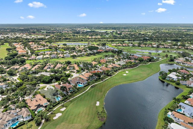 bird's eye view with a water view and a residential view
