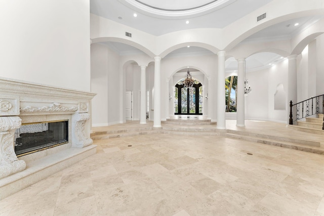 interior space with stairway, an inviting chandelier, a fireplace, visible vents, and recessed lighting