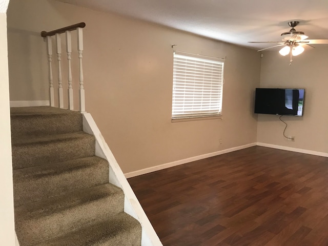 interior space with hardwood / wood-style flooring and ceiling fan