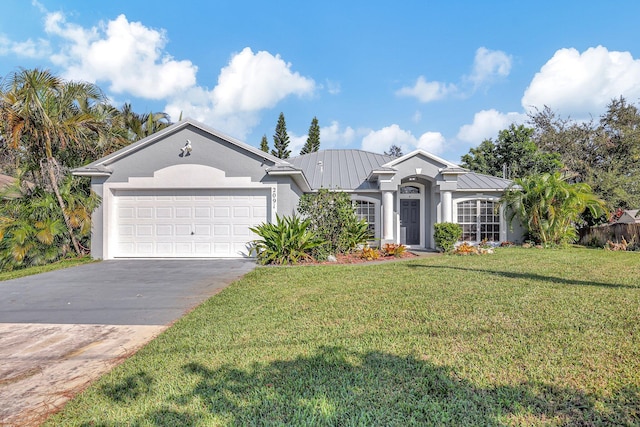 single story home with a garage and a front lawn