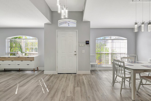 entrance foyer featuring light wood-type flooring