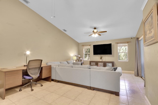 tiled living room with ceiling fan and vaulted ceiling