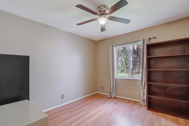 interior space featuring ceiling fan and light wood-type flooring