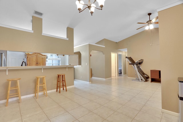 living room with light tile patterned floors, high vaulted ceiling, and ceiling fan with notable chandelier