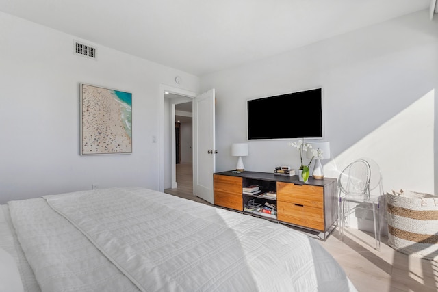 bedroom featuring hardwood / wood-style flooring