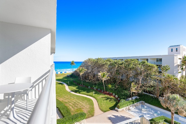 balcony featuring a water view