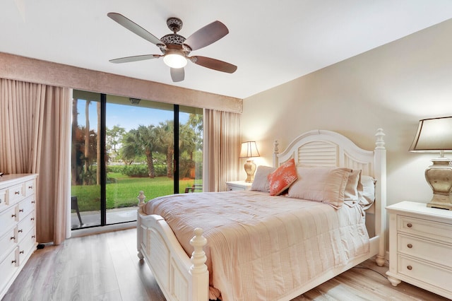 bedroom with access to outside, light hardwood / wood-style flooring, and ceiling fan