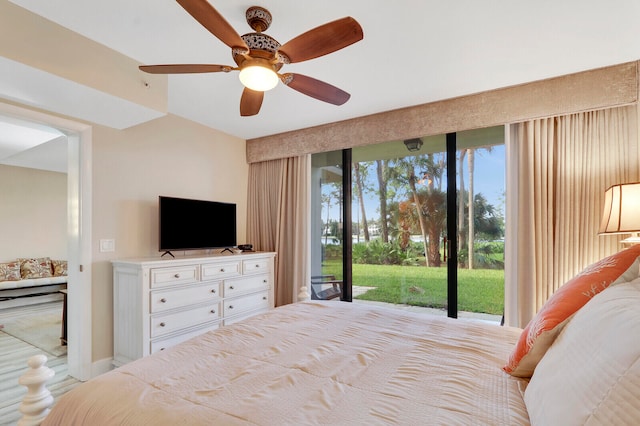 unfurnished bedroom with access to outside and ceiling fan