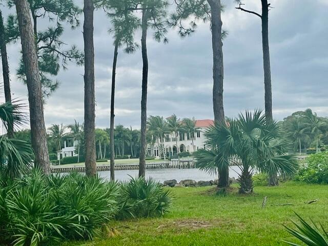 view of home's community featuring a water view