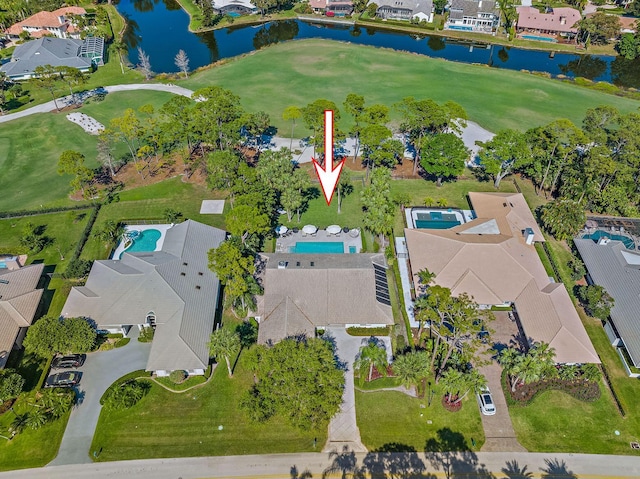 bird's eye view featuring a residential view, view of golf course, and a water view
