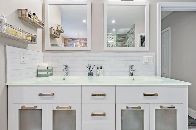 full bathroom featuring a sink, backsplash, and double vanity