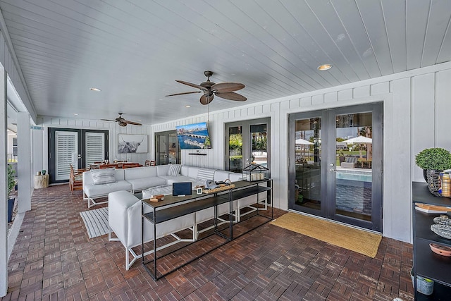 view of patio / terrace with french doors, an outdoor hangout area, and ceiling fan