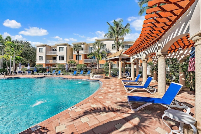 pool featuring a patio area