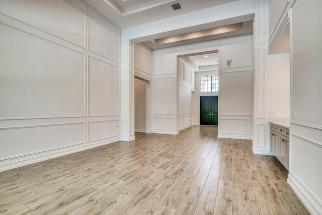 unfurnished room featuring light hardwood / wood-style flooring