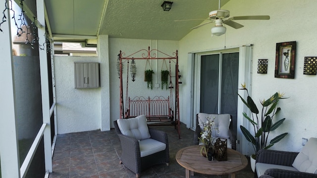 view of patio / terrace featuring ceiling fan