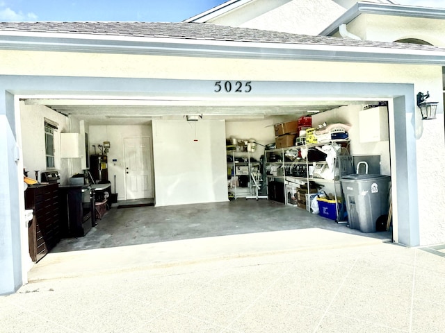 garage featuring electric water heater