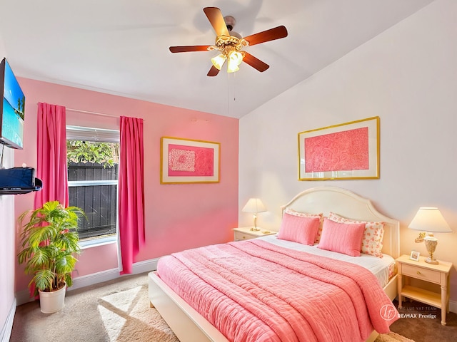 carpeted bedroom with lofted ceiling and ceiling fan