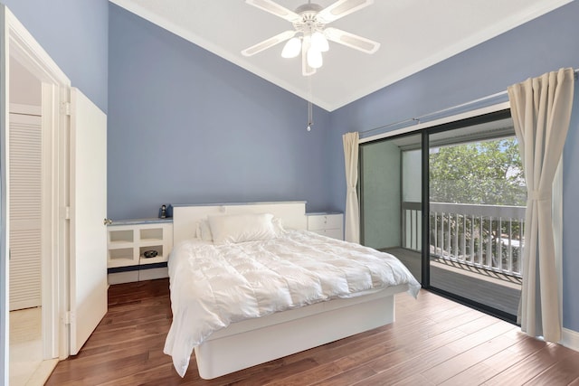 bedroom featuring access to outside, a ceiling fan, vaulted ceiling, and wood finished floors