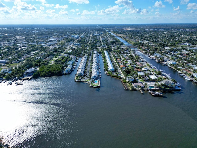 bird's eye view with a residential view and a water view