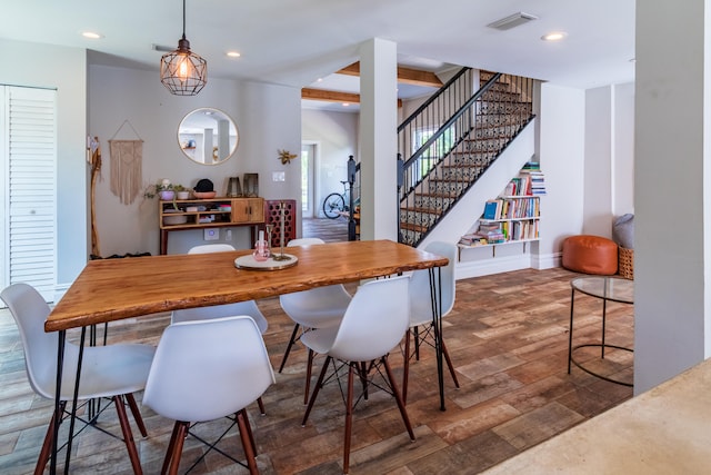 dining area featuring dark hardwood / wood-style flooring