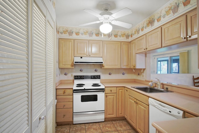 kitchen featuring decorative backsplash, light brown cabinets, sink, white appliances, and ceiling fan