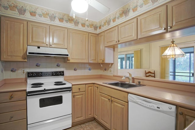 kitchen featuring ventilation hood, light brown cabinetry, a sink, white appliances, and light countertops