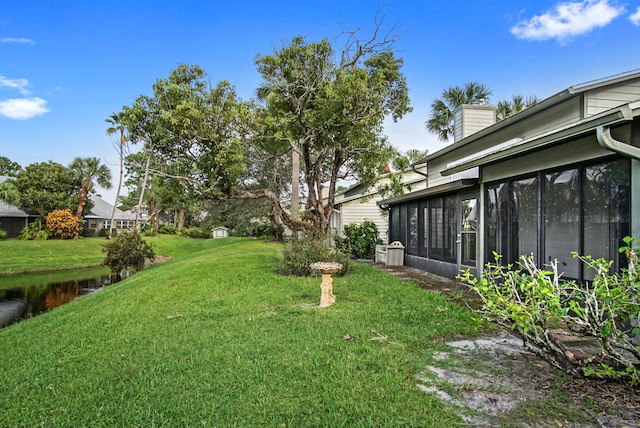 view of yard with a sunroom