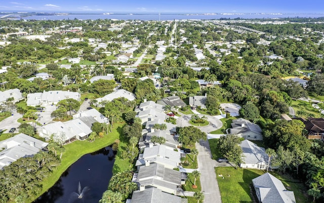aerial view featuring a water view and a residential view