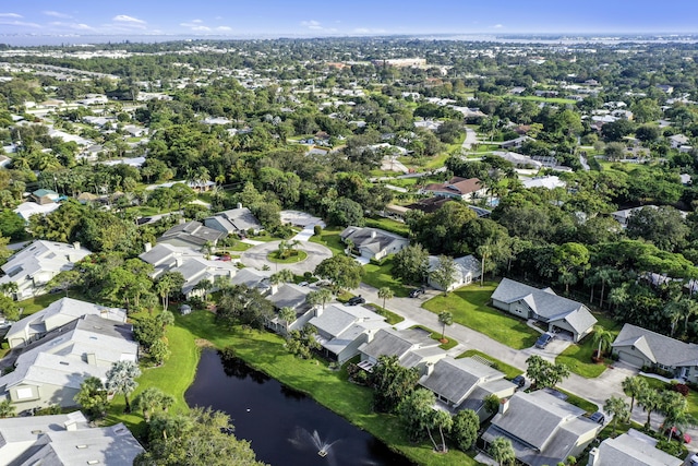 bird's eye view featuring a residential view and a water view
