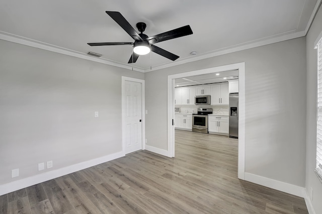 unfurnished living room featuring crown molding, light wood-type flooring, and ceiling fan