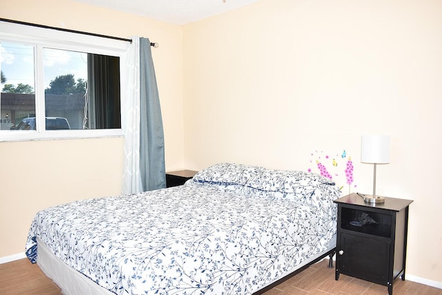 bedroom featuring hardwood / wood-style floors