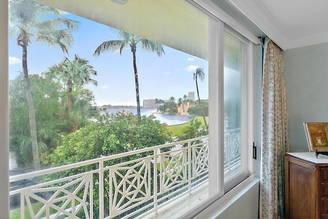 balcony featuring a water view