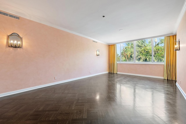 425 Worth Ave Unit 2F, Palm Beach, FL 33480 - unfurnished room featuring baseboards, ornamental molding, and a chandelier