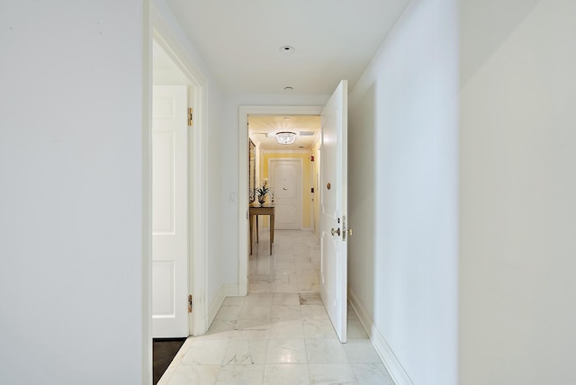 425 Worth Ave Unit 2F, Palm Beach, FL 33480 - hall with light marble finish flooring and baseboards