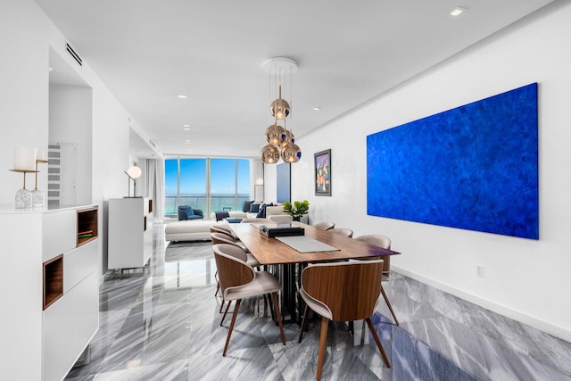 dining room with floor to ceiling windows