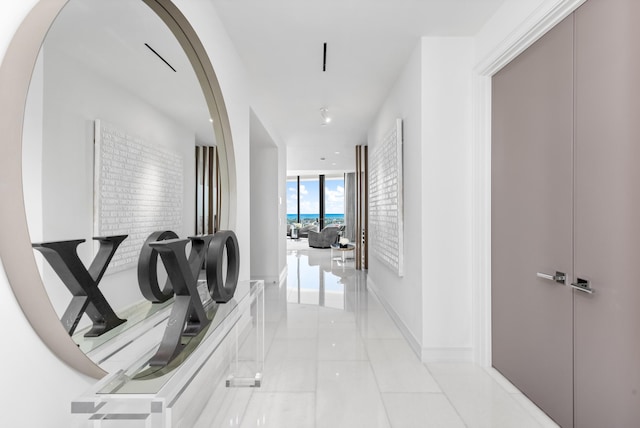 hallway featuring light tile patterned flooring