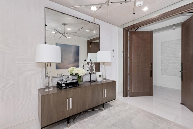 hallway with light tile patterned floors