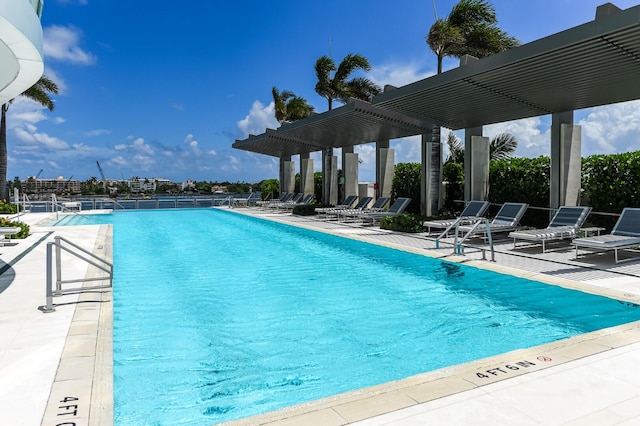 view of swimming pool with a patio area