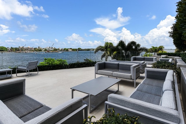 view of patio featuring an outdoor hangout area and a water view