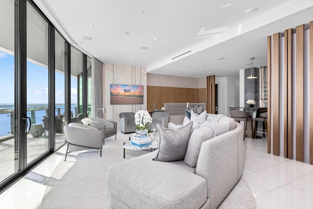 tiled living room with expansive windows