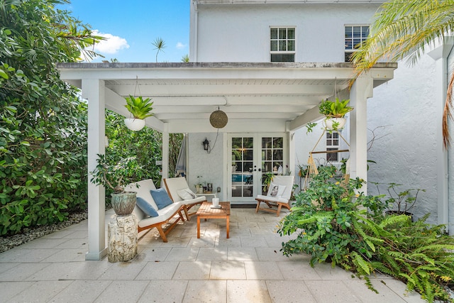 view of patio featuring french doors