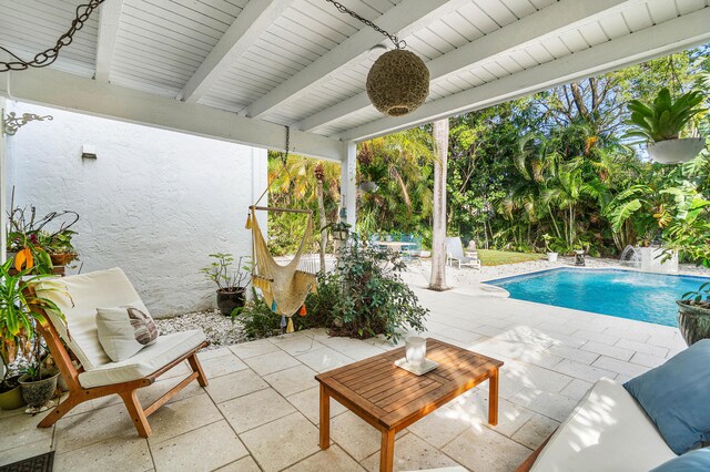 323 Dyer Rd, West Palm Beach, FL 33405 - view of swimming pool featuring a patio area