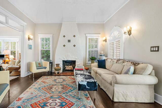 323 Dyer Rd, West Palm Beach, FL 33405 - living area with wood finished floors, crown molding, and baseboards