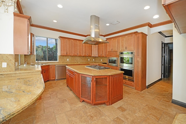 kitchen featuring tasteful backsplash, island range hood, stainless steel appliances, crown molding, and a center island