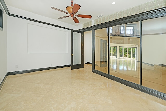 interior space featuring ceiling fan